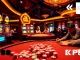Kp88 gaming environment with players at a roulette table and vibrant slot machines.