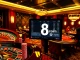 Players excitedly place bets at S8.com, showcasing a dynamic casino environment with vivid roulette wheels and poker chips.