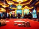Players enjoy high-stakes poker at 88aa casino, showcasing luxury and excitement.