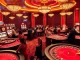 Excited players engage in lively games at open888, showcasing luxury casino gaming atmosphere.
