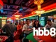 Exciting gaming scene at hb88 online casino with diverse players enjoying roulette and slots.