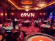 Experience the vibrant atmosphere of 69VN Casino with exciting gaming options and luxurious decor.